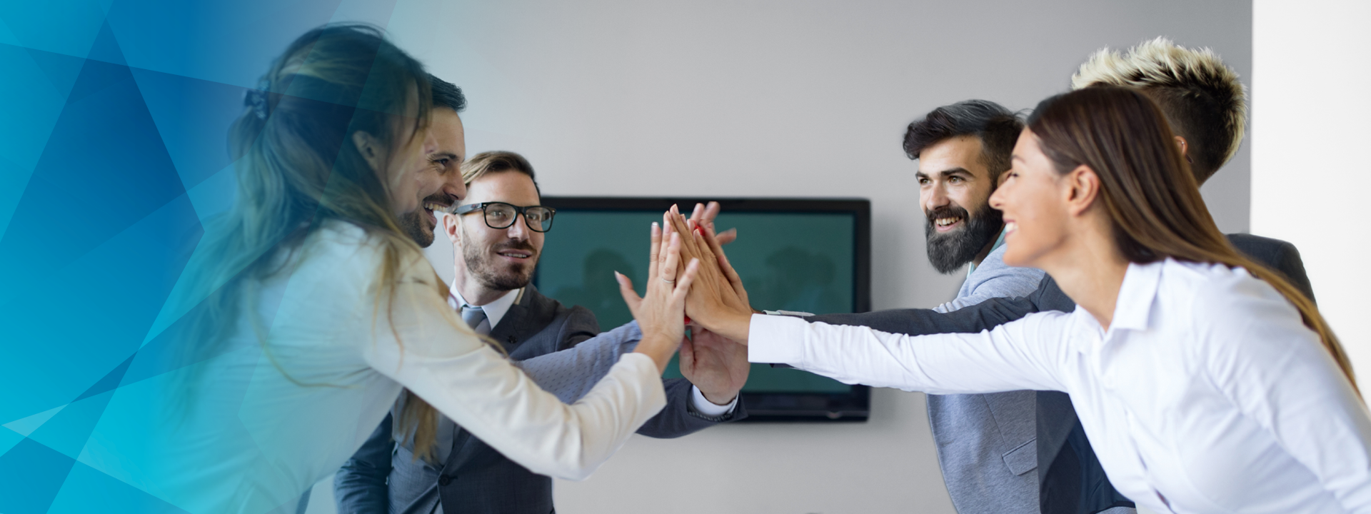 Four people, hands in the middle for high-fives