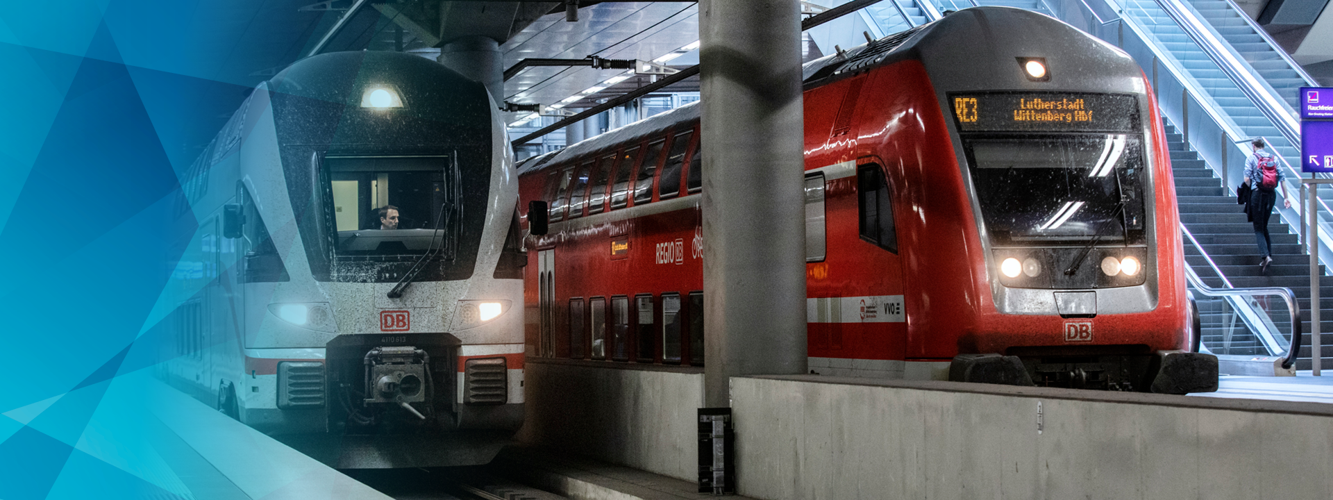 Two trains side by side in a station