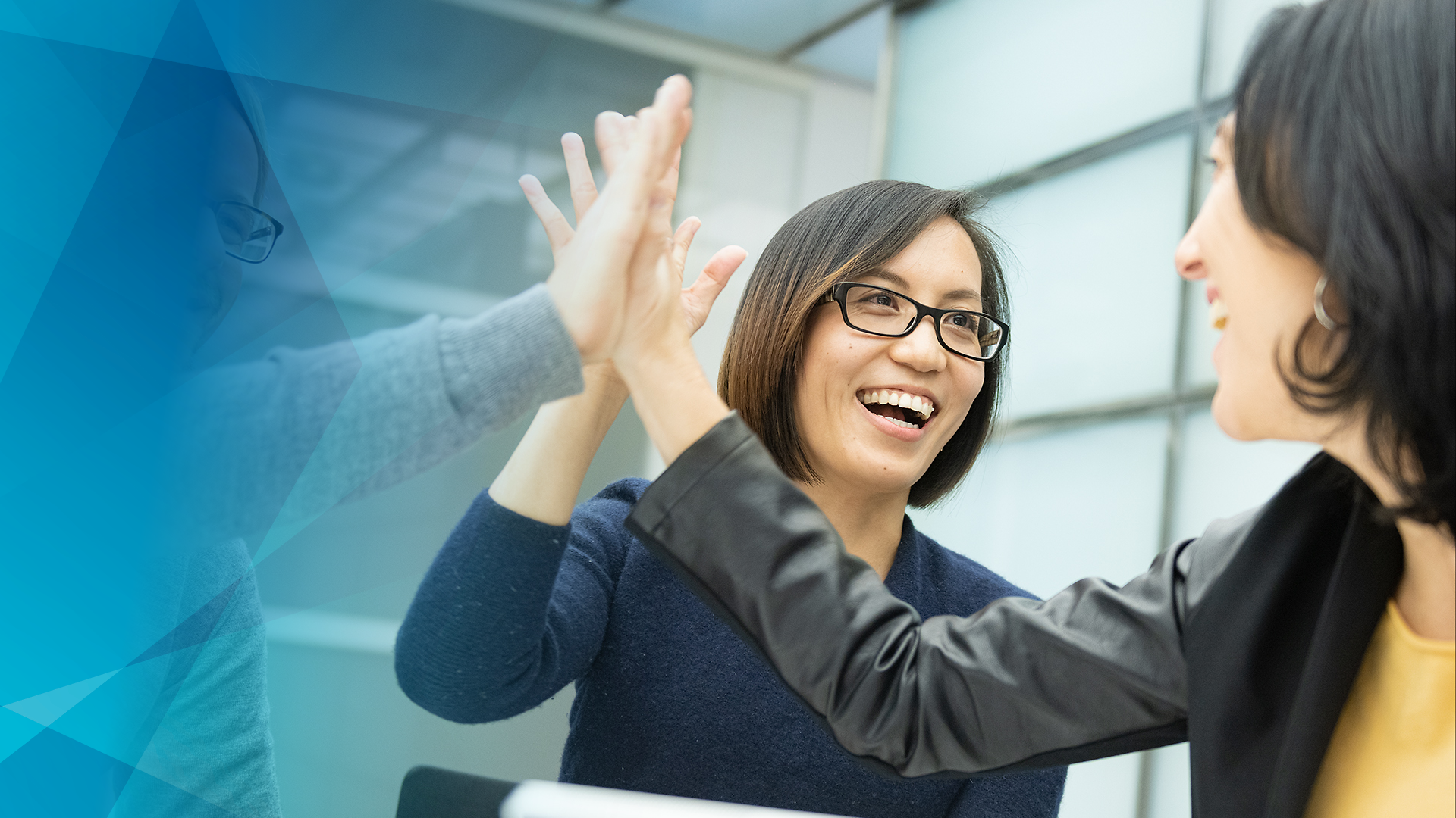 Several people with a high-five