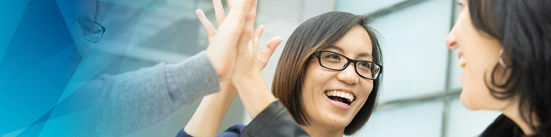 Several people with a high-five